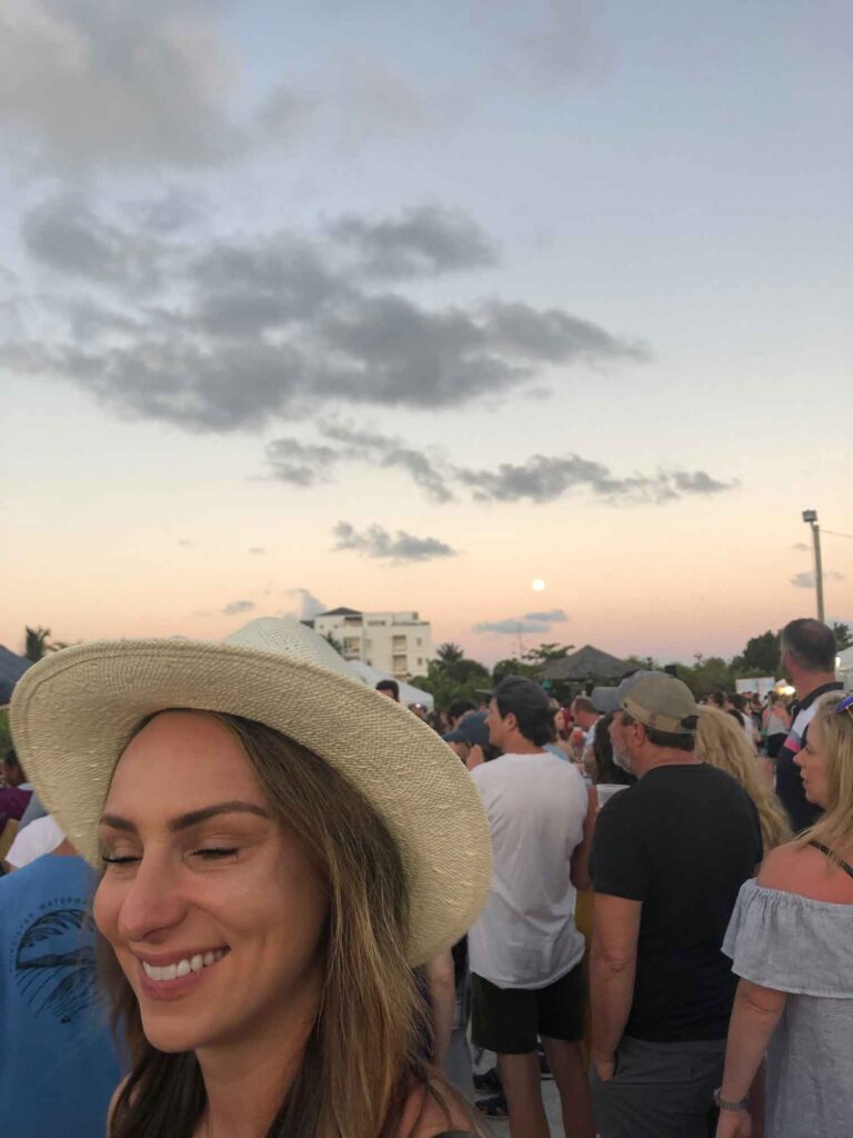 fish fry, girl in hat, moon rising, sunset